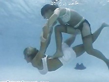 Sexy Babes Tussle Underwater