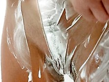 Alice Inside The Toilet Lathers Her Vagina With Foam Then Shaves,  Leaving A Strip Of Hair On Her Pubis