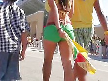 Candid Voyeur Scene With Brunette In Tiny Top At A Festival