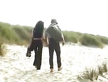 Beach Couple With A Friend