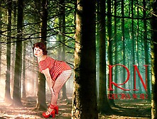 Pin-Up Lady Posing In The Forest.  She Shows Her Tits And Pussy.  Mesh Tights.  Special Effect.