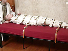 Insane Patient Mummified And Straight Jacketed