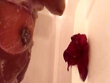 Busty Ebony In The Shower Rubbing On Tits