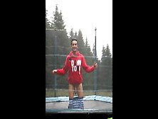 Teen Shows His Big Cock For Fun On A Trampoline At The Camp