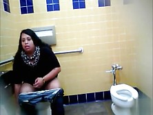 Lovely Brazilian Fattie Gets Recorded Urinating Hard In A Public Restroom