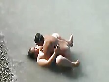 Horny Couple Fucks In The Water At The Beach