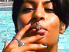 Latina Smokes And Catches Sun Outdoors