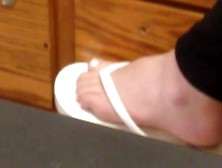 Teen Beautiful Feet In Flip Flops