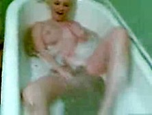 Sweet Blonde Playing With Her Delicious Body In The Bathtub