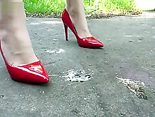 Lena Crushing Roaches In Sexy Red High Heels.