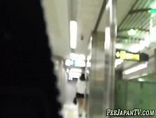 Oriental Babe Pissing In Public