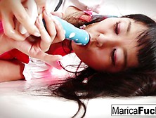 Asian Marica Hase Uses A Glass Toy