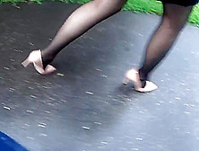 Following Candid Woman In Black Pantyhose And High Heels