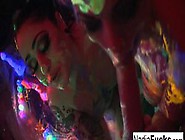 Black-Light Babes Nadia White And Ophelia Suck Off A Colorful Cock