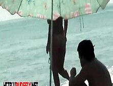 Cutie Flaunts Her Perky Boobs In Front Of A Nudist Beach Voyeur