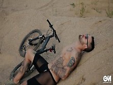 Full Body Tattoo Man On Bicycle Strips And Shows His Uncut Fores