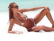 Hot Beach Babe In Tiny Bikini Posing