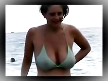 Wife's Giant Tits On Display In Thin Bikini