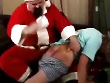 Santa Claus Spanks Bad Boy's Ass
