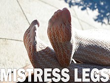 Mistress Legs In White Tights Outdoor