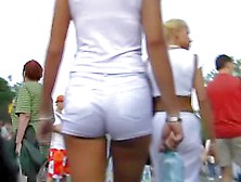 Girl In White Skirt Walks With Her Lucky Boyfriend