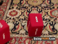Dices Decided Which Swinger Will Be Fucked At The Red Room By A Mature Or Young Swinger Couple.
