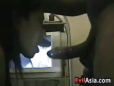 Asian Slut Sucking On A Black Cock