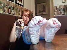 Smiley Redhead Babe From The Uk Exposing Her Soles While Drinking Beer At The Pub