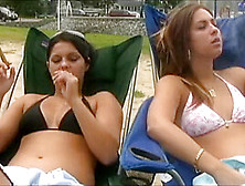 2 Girls Have A Cigar At The Beach