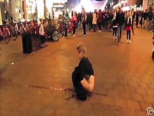 Brave Blonde Urinates On The Middle Of The Crowded Street!