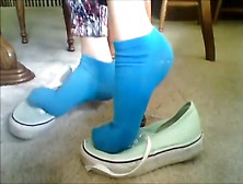 Girl With Sexy Blue Socks On The Floor