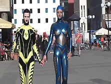 Through The City In A Tight Latex Costume - Watch4Fetish