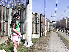 Cute Brunette Filly Fingers Her Pussy At The Train Station