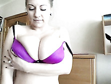 Passionate Model With A Purple Bra Rubs Her Massive Natural Knockers