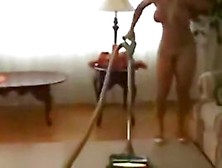 Girlfriend Stripping During The Time That This Babe Cleans The Living Room