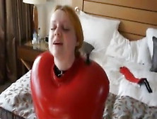 Inflatable Redlatex Sack And Gagged Mouth