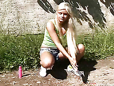 Blonde Teen Masturbating In The Garden