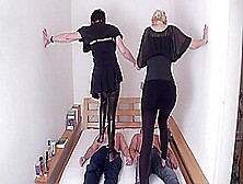 Brunette And Blonde Are Trampling On Their Slaves By Femdom Austria