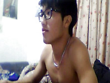 Japanese Nerd Jerks And Shoots A Load On Web Cam