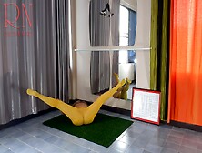 Regina Noir.  Yoga In Yellow Tights Doing Yoga In The Gym.  3