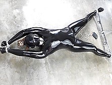 Rubber-Bound Girl In Electro Play