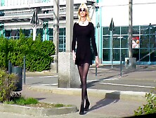 Crossdresser Femboy In Black Dress,  Stockings And High Heels