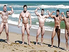 Muscle Men On The Beach