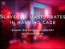 Slavegirl Masturbates In Hanging Cage