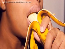 Naughty Ebony With Pouty Lips Playing With A Banana