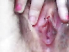 A Hairy Pussy Gets Masturbated In A Close Up Clip