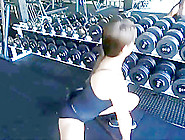 Squatting With Iron Bar Rubbing On The Cunt