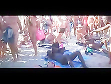 Bisexual Women Amateurs Fuck On A Beach Among Voyeurs