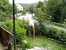 Nudic Working In The Garden