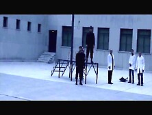 Warning Women Hanged In Hijab By A Female Guard